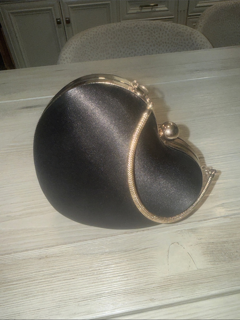 Elegant Black Heart-Shaped Evening Clutch with Gold Accent